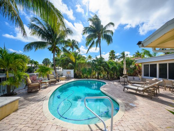 Pompano Beach 3 Bedroom Canal Front Vacation Pool Home