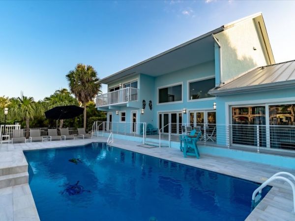 Key Colony Beach Pool Home with Boat Dock Steps To Beach