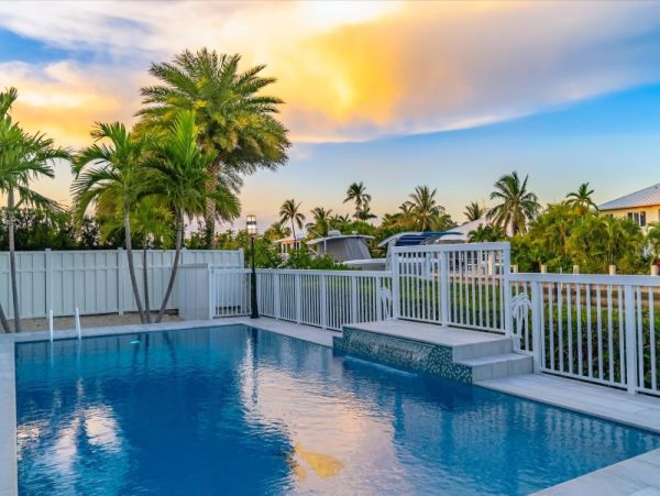 Key Colony Beach Pool Home with Boat Dock Steps To Beach