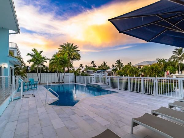 Key Colony Beach Pool Home with Boat Dock Steps To Beach