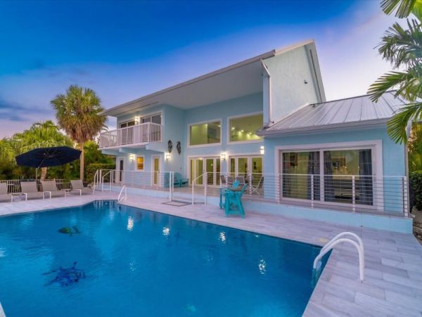 Key Colony Beach Pool Home with Boat Dock Steps To Beach