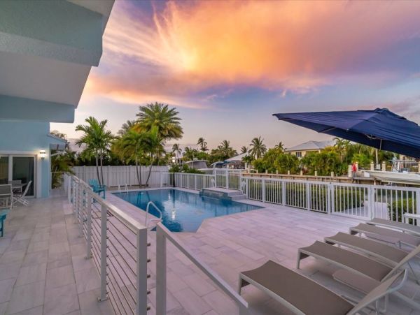 Key Colony Beach Pool Home with Boat Dock Steps To Beach