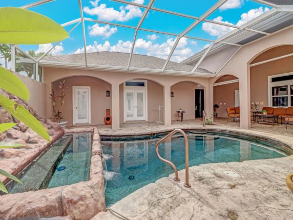 Cape Coral Vacation Home Three Bedrooms & Private Caged Pool