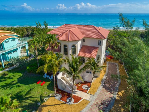 Beach Front 9 Bedroom Home with Private Pool & Views
