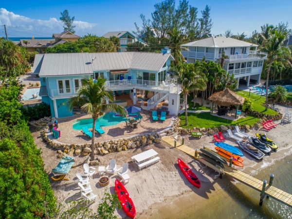 Double Your Fun With 2 Side-By-Side Homes with 11 Bedrooms and 2 of EVERYTHING