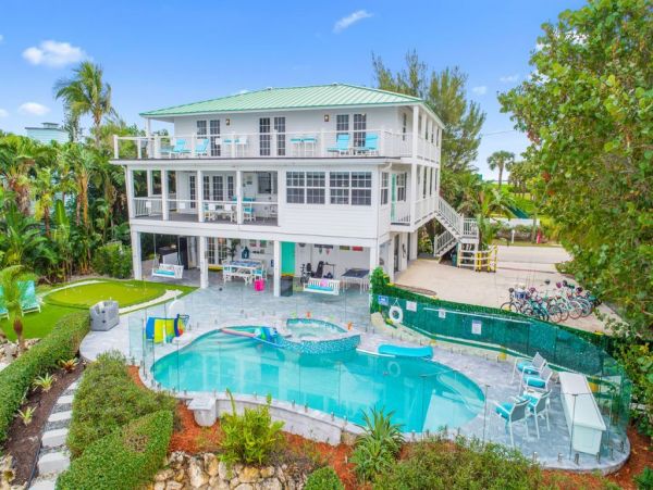 Double Your Fun With 2 Side-By-Side Homes with 11 Bedrooms and 2 of EVERYTHING