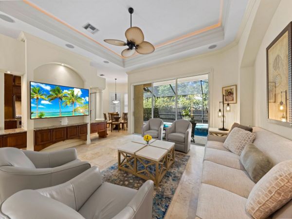 Four Bedroom Fun Home with Pool and Tiki Bar with TV