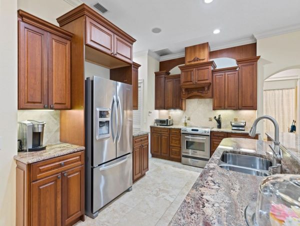 Four Bedroom Fun Home with Pool and Tiki Bar with TV