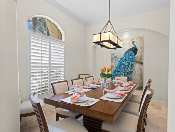 Four Bedroom Fun Home with Pool and Tiki Bar with TV