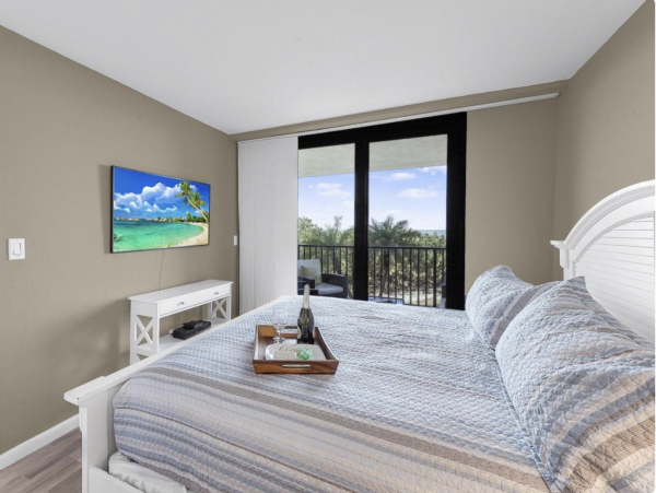 Beachfront Bliss - Spacious 2 Bedroom Condo with Gulf Views, Steps to Sand