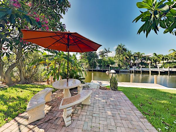 Canal-Front Vacation Home with Pool and Boat Dock