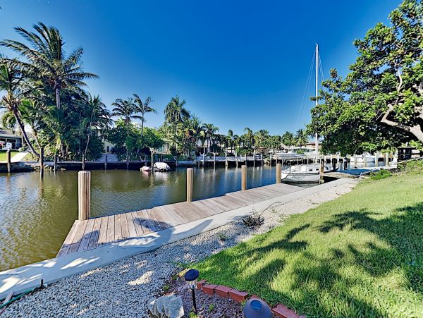 Canal-Front Vacation Home with Pool and Boat Dock
