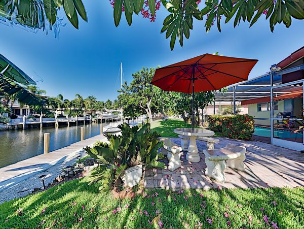 Canal-Front Vacation Home with Pool and Boat Dock