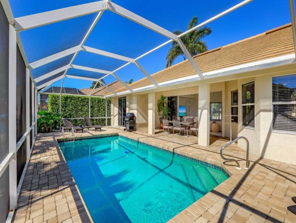 Canal Front 4 Bedroom Vacation Pool Home in Marco Island