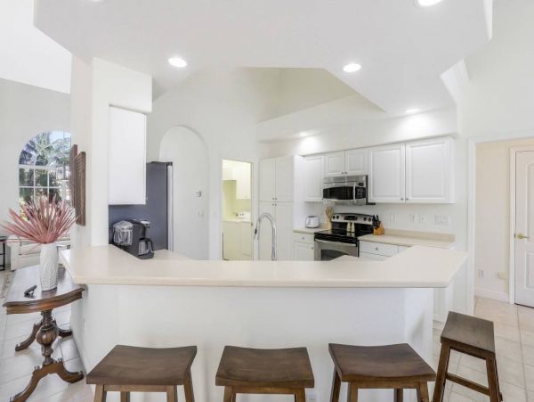 Canal Front 4 Bedroom Vacation Pool Home in Marco Island
