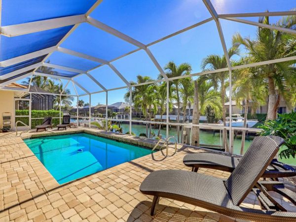 Canal Front 4 Bedroom Vacation Pool Home in Marco Island