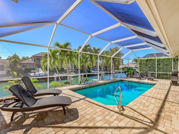 Canal Front 4 Bedroom Vacation Pool Home in Marco Island