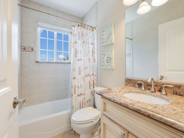 Holmes Beach Vacation Rental - Anna Maria Island Luxury Rental with Pool & Outdoor Kitchen