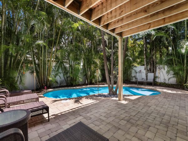 Holmes Beach Vacation Rental - Anna Maria Island Luxury Rental with Pool & Outdoor Kitchen
