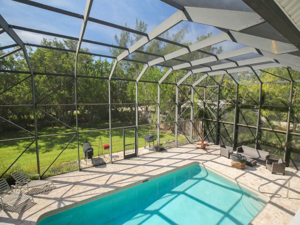 Private Pool Home Located close to the Beach.