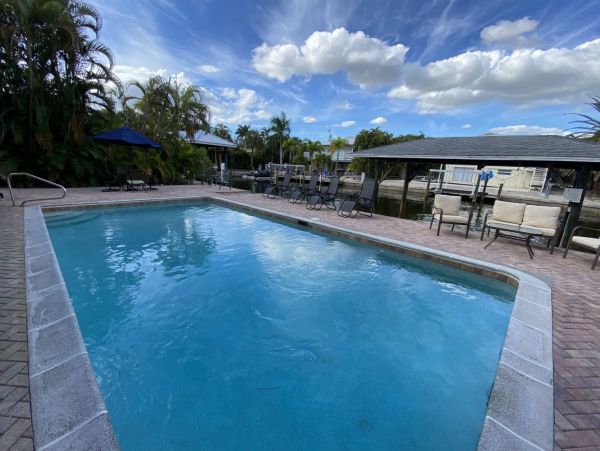 Fort Myers Vacation Condo Walk to Beach with Pool Canal View