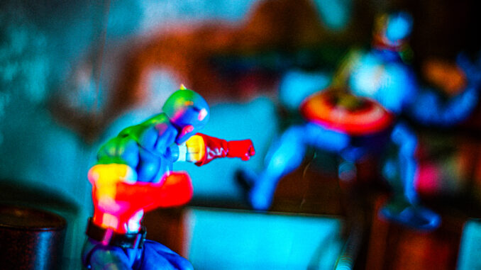 cap and venom action shot