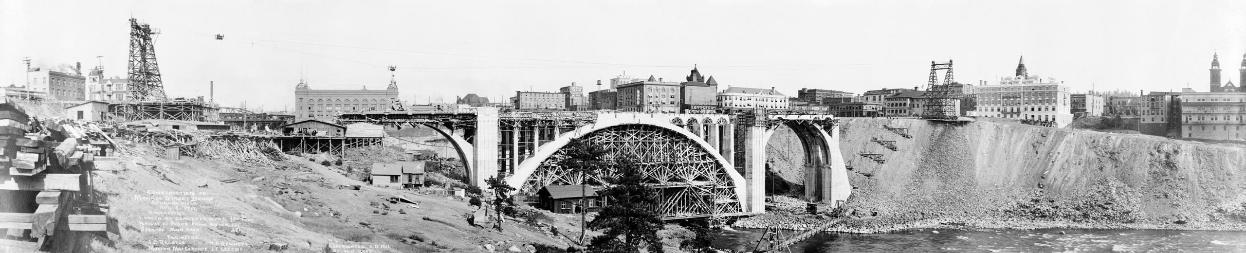 Falsework centering in the center arch of Monroe Street Bridge, Spokane, Washington, 1911. An elaborate wooden structure is supporting concrete until it can self-stand. Falsework centering in the center arch of Monroe Street Bridge, Spokane, Washington, 1911. An elaborate wooden structure is supporting concrete until it can self-stand.