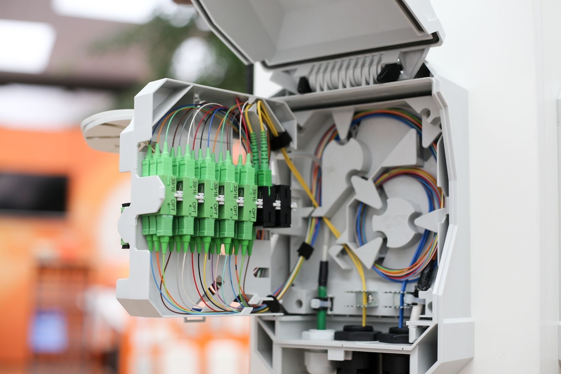 What encryption methods are commonly used to secure data transmitted over fiber optic networks?