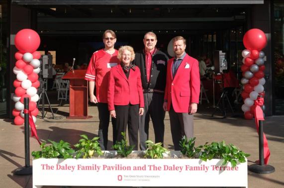 Photo of the Daley family in front of the new Daley Pavilion