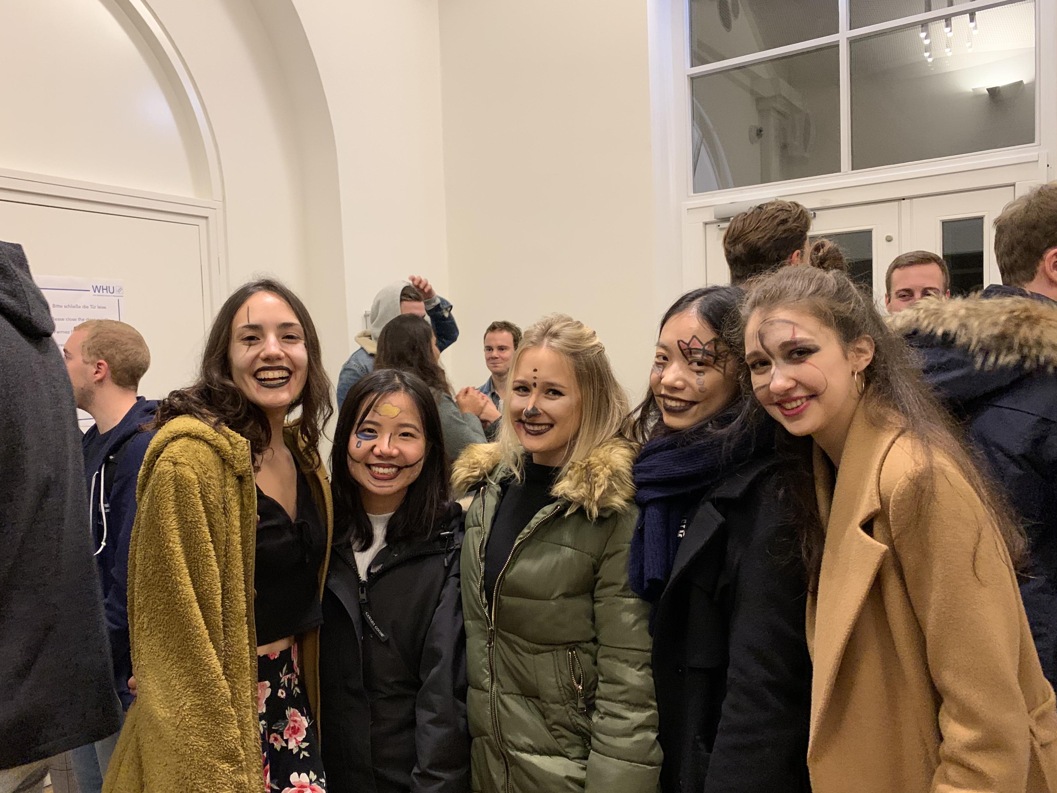Five students pose for a photo in Germany