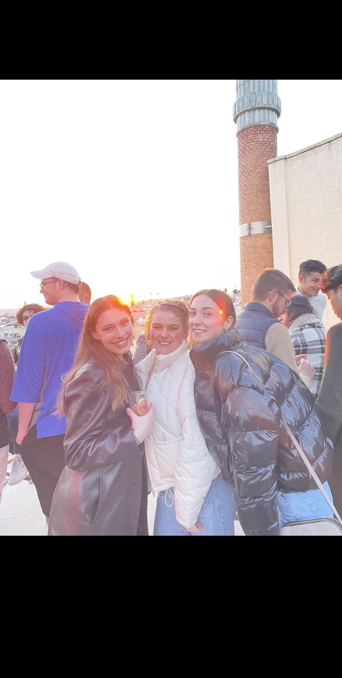Ella Calleri and two friends at a rooftop event for our school 