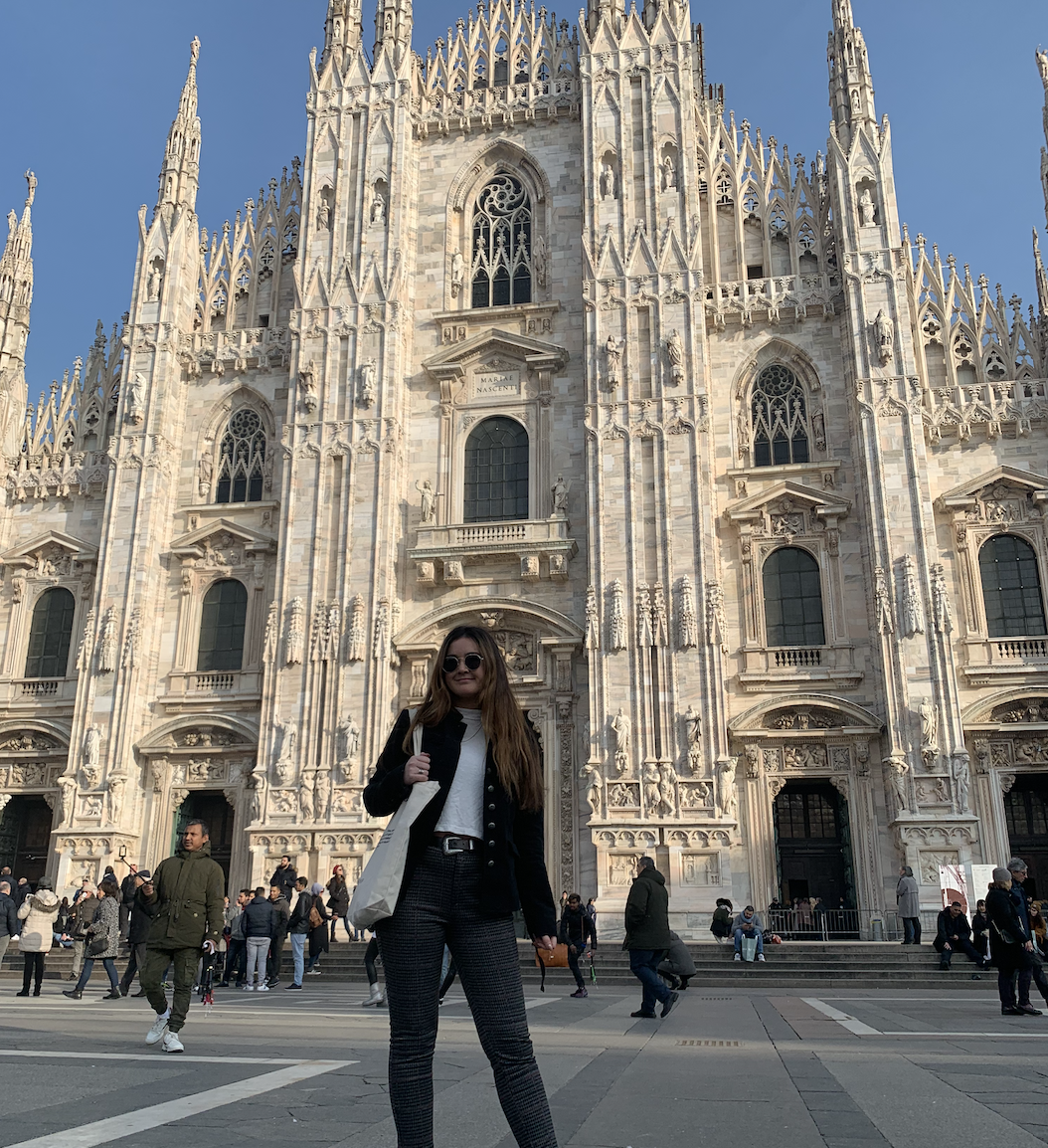 Student Behind a building