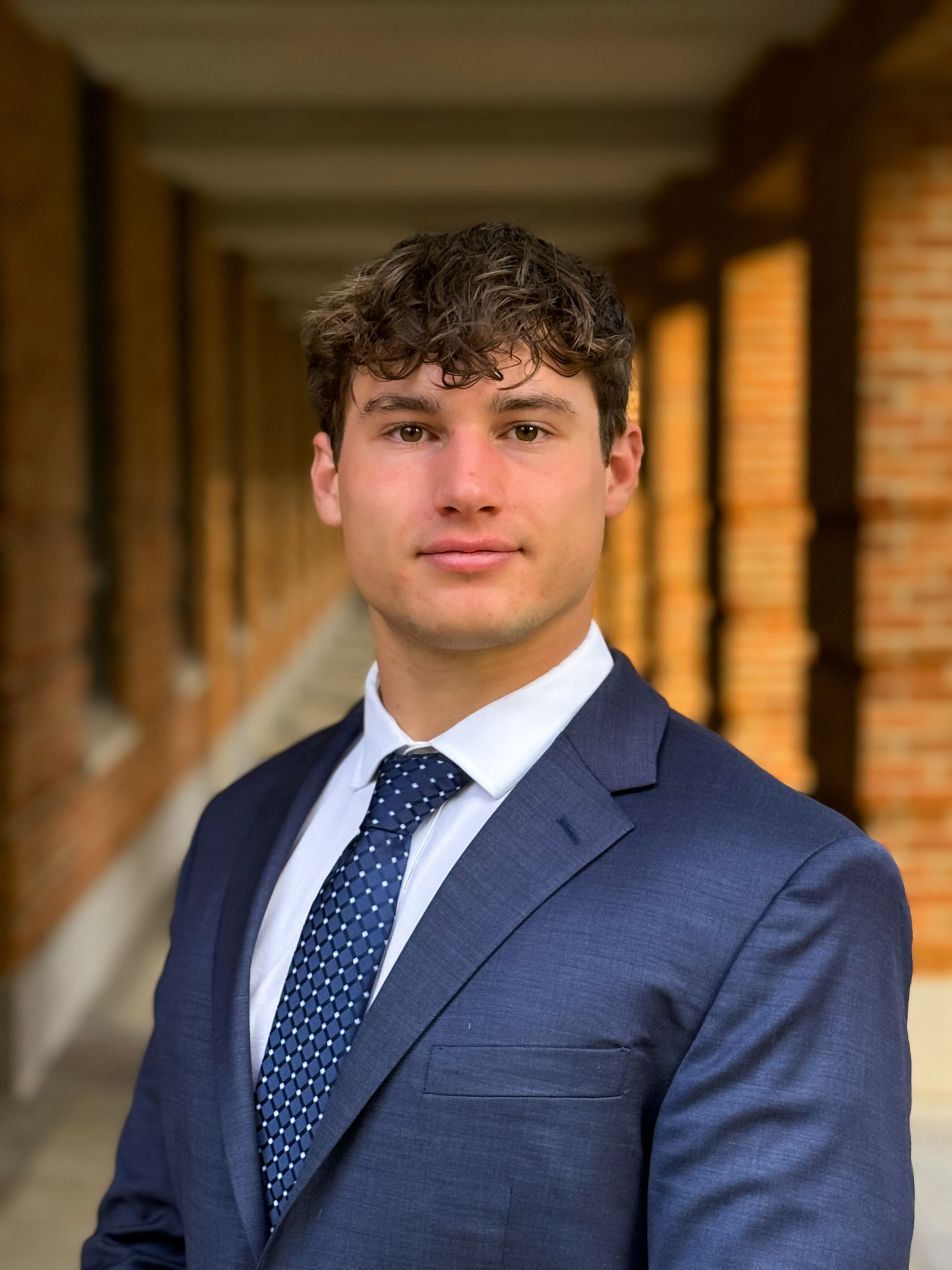 Man with a blue tux and blue tie