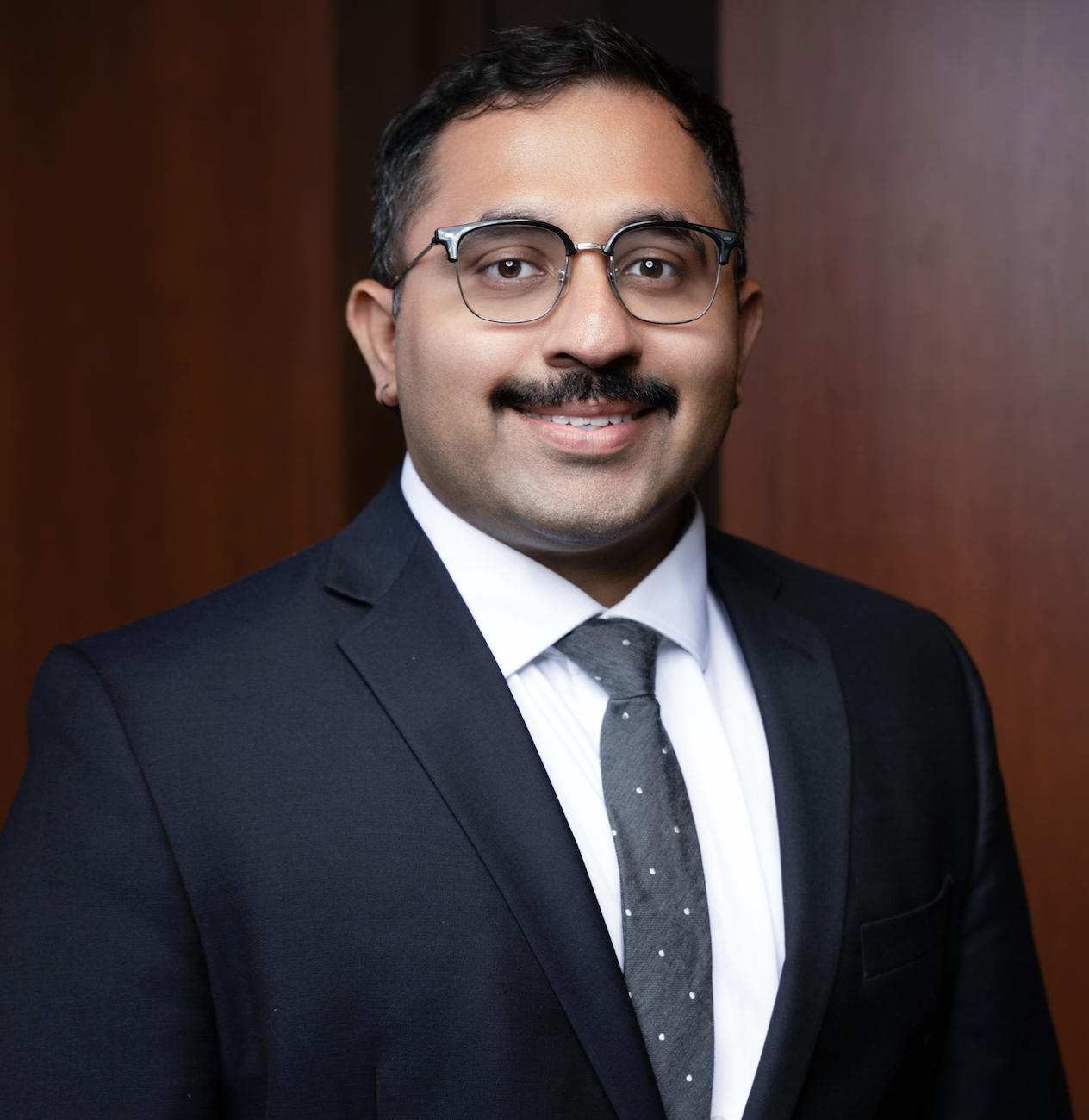 Image of a man in a suit that is the GA