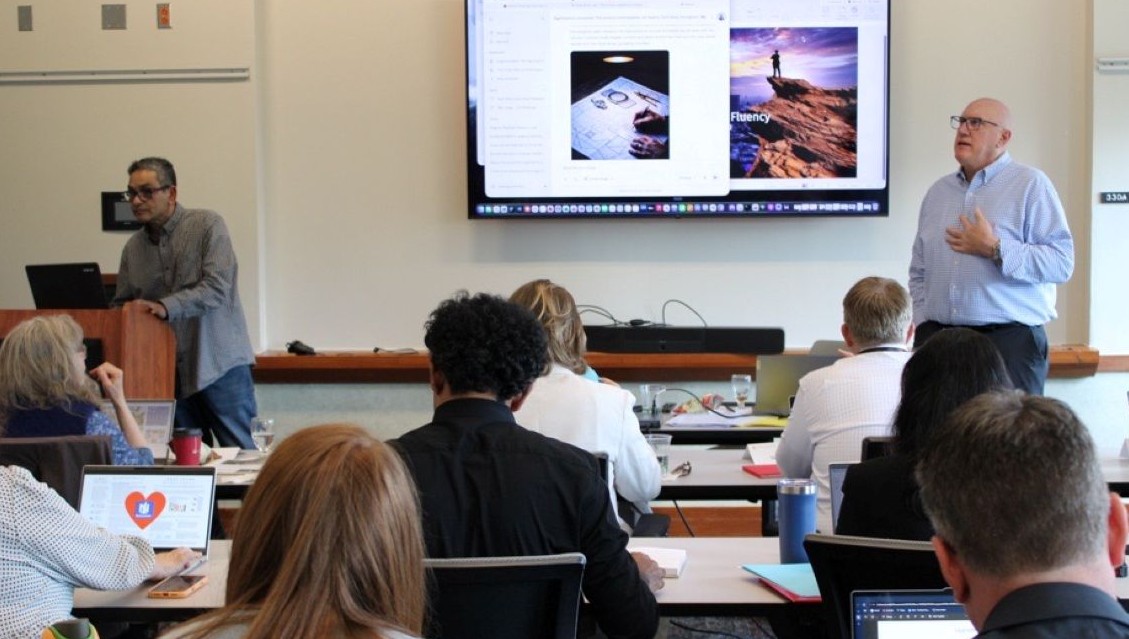 Srini Koushik and Scott Ebbrecht teaching participants in the AI Fluency Jumpstart for Executives program
