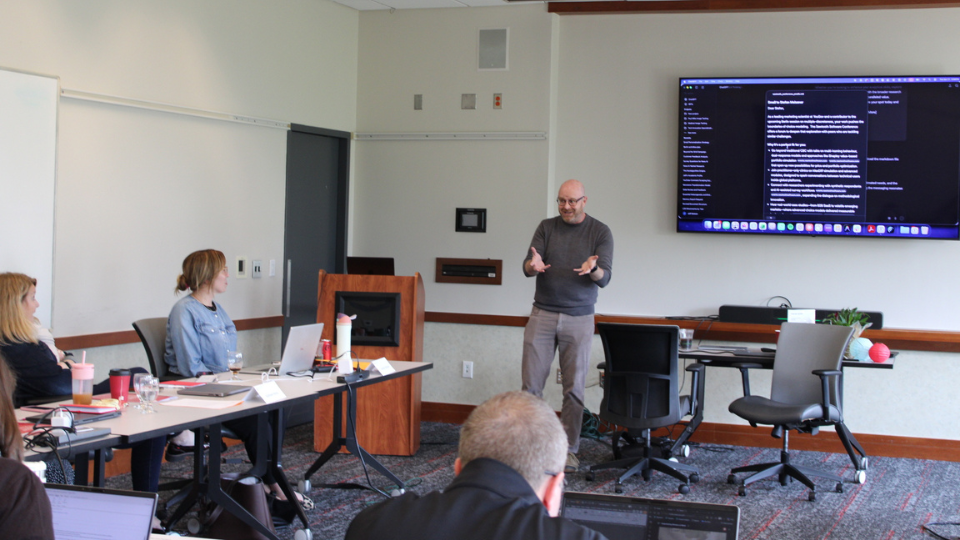 Jeff Dotson teaching a class of executives about AI