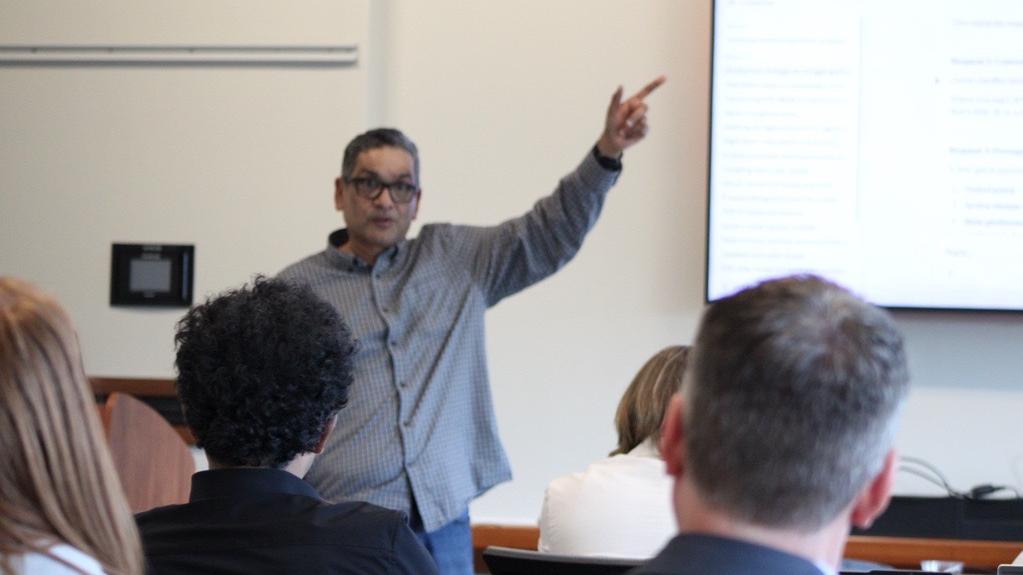 Srini Koushik teaching participants in the AI Fluency Jumpstart for Executives