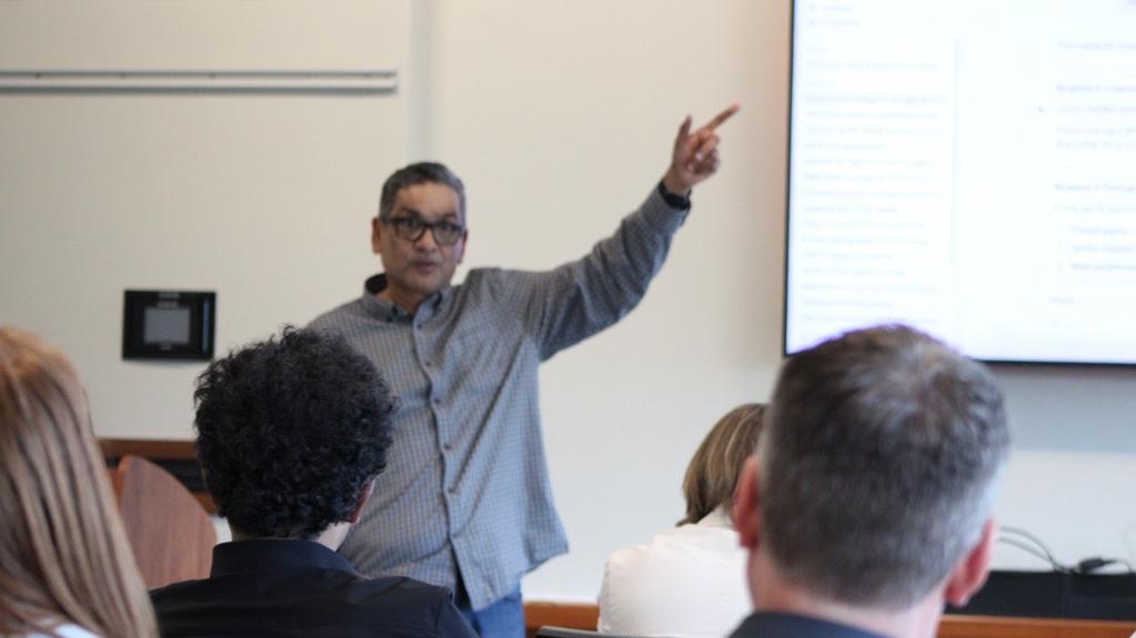Srini Koushik teaching participants in the AI Fluency Jumpstart for Executives