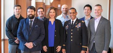 A group of 8 military and veteran executive education students