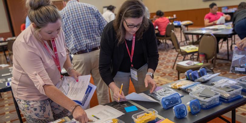 2 women doing an operational excellence activity