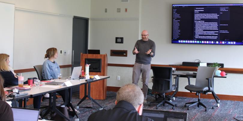 Jeff Dotson teaching a class of executives about AI