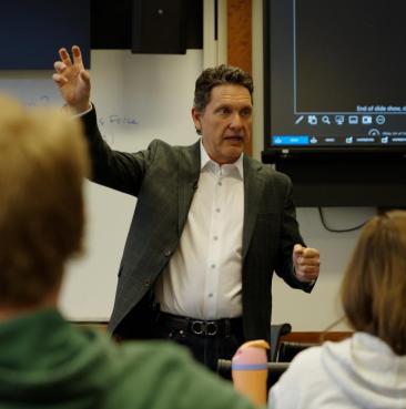 image of Prestel speaking to students