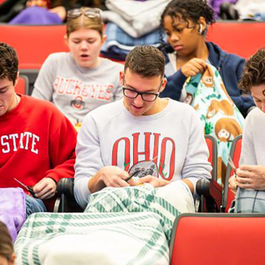 Students make blankets as part of Fisher Impact Day 2023