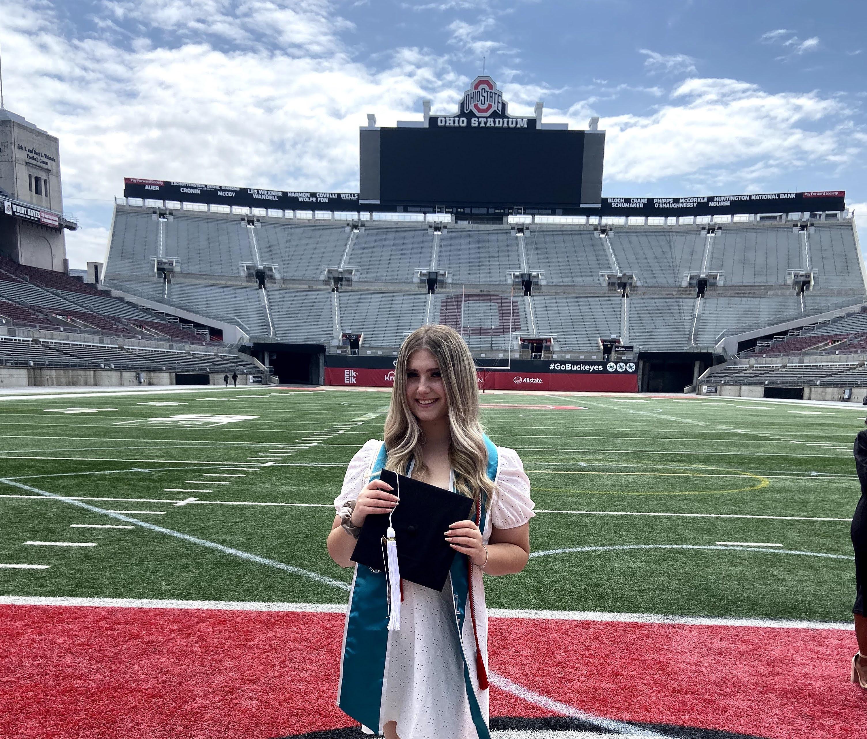Traci on the field of Ohio Stadium