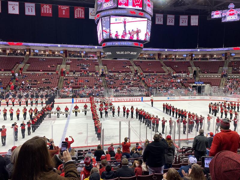 Photo of the Ohio State Marching Band on the ice for an OSU Hockey game. 