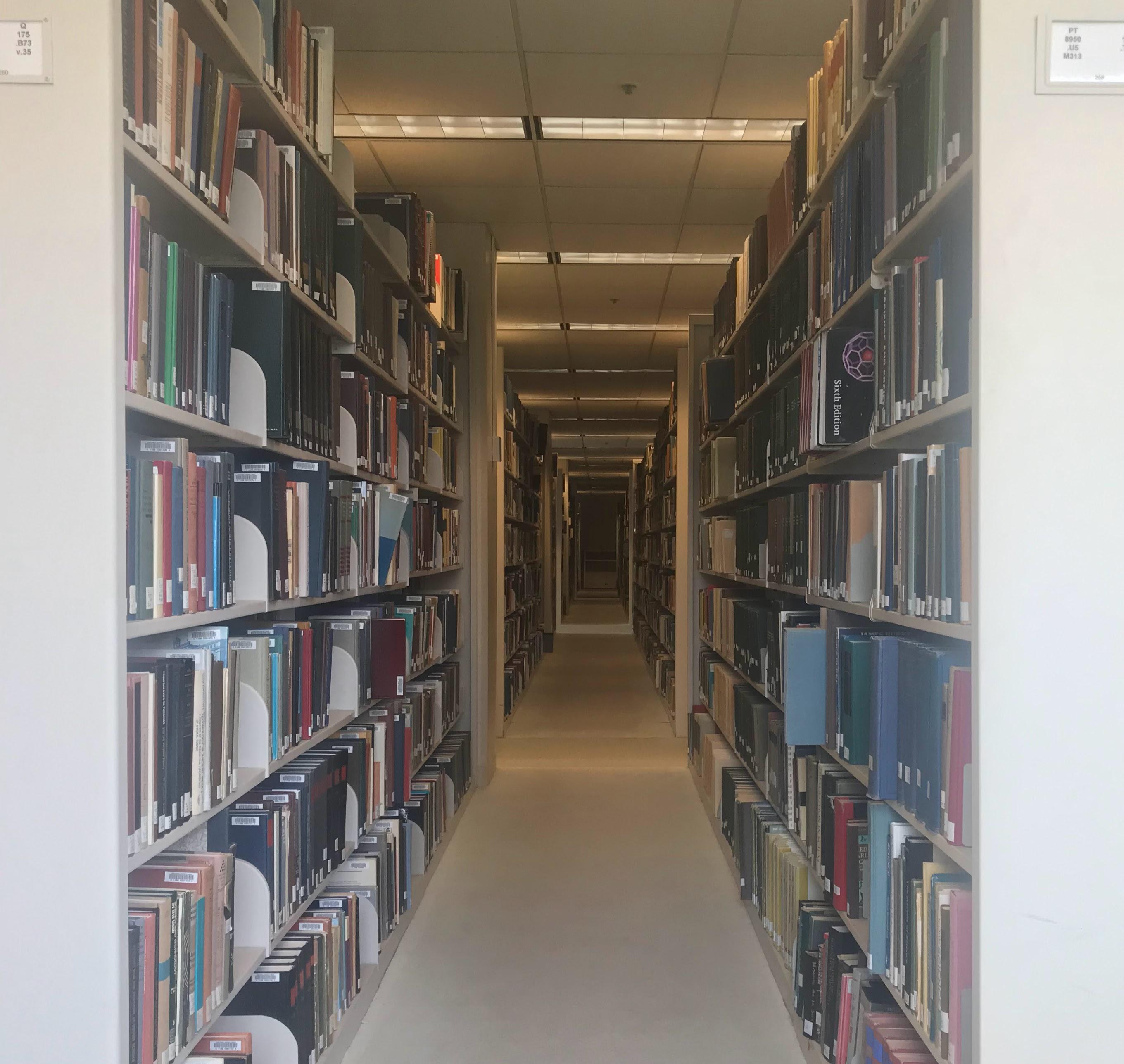 A row of shelves in a library.