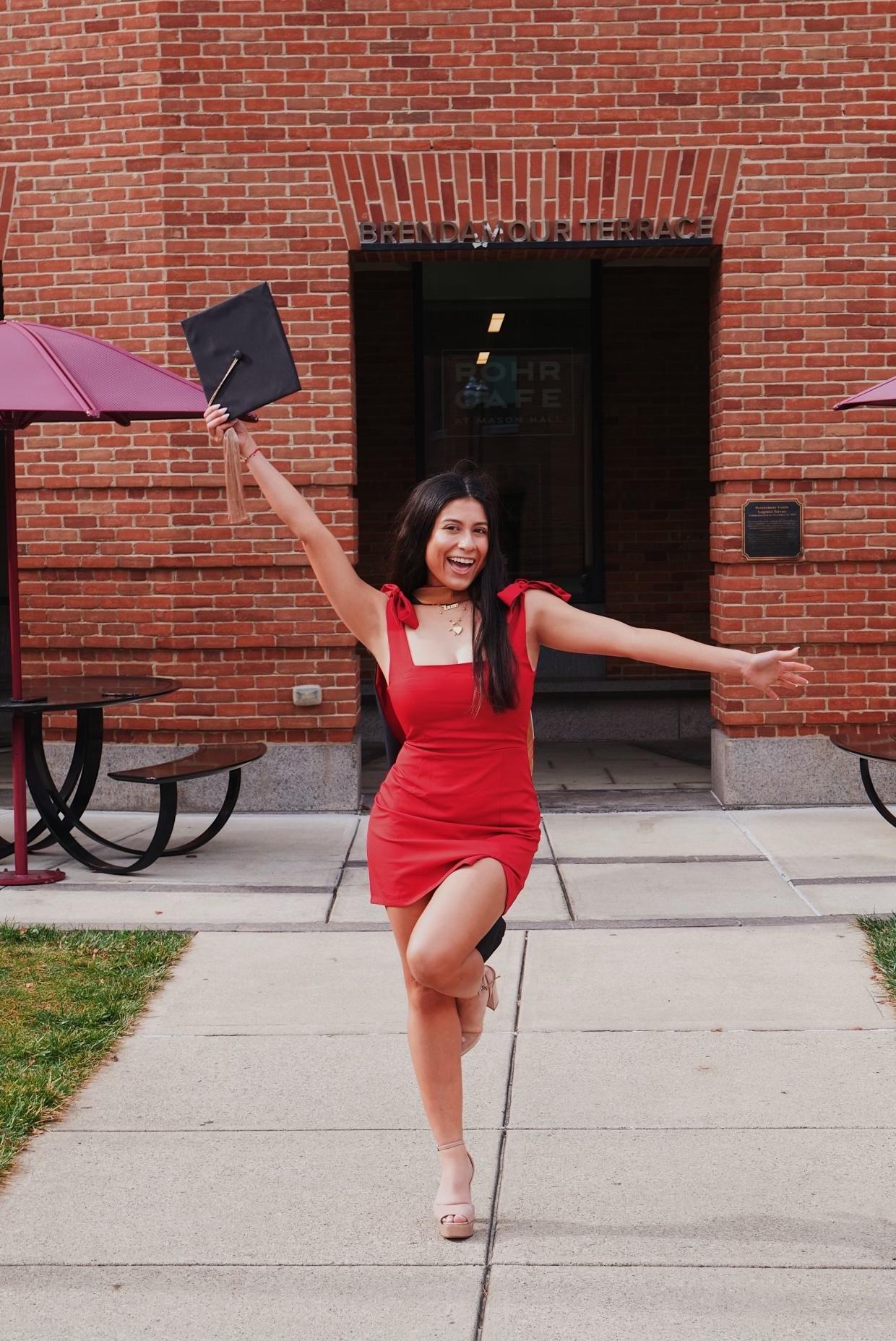 Woman celebrating getting her Master's degree 