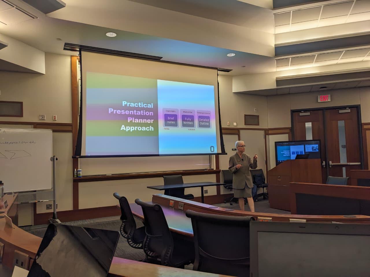 Dr. Lori Kendall teaching the MBA class about the art of giving Presentation.