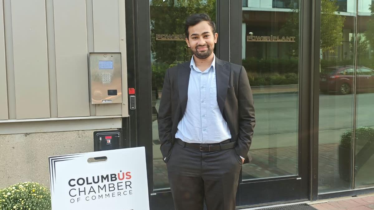 Image of me infront of Columbus Chamber of Commerce Networking Event