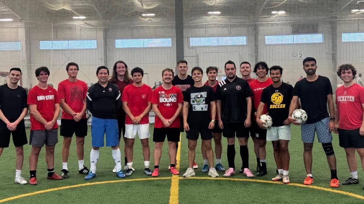 MBA students on a soccer field in the Ohio State ARC